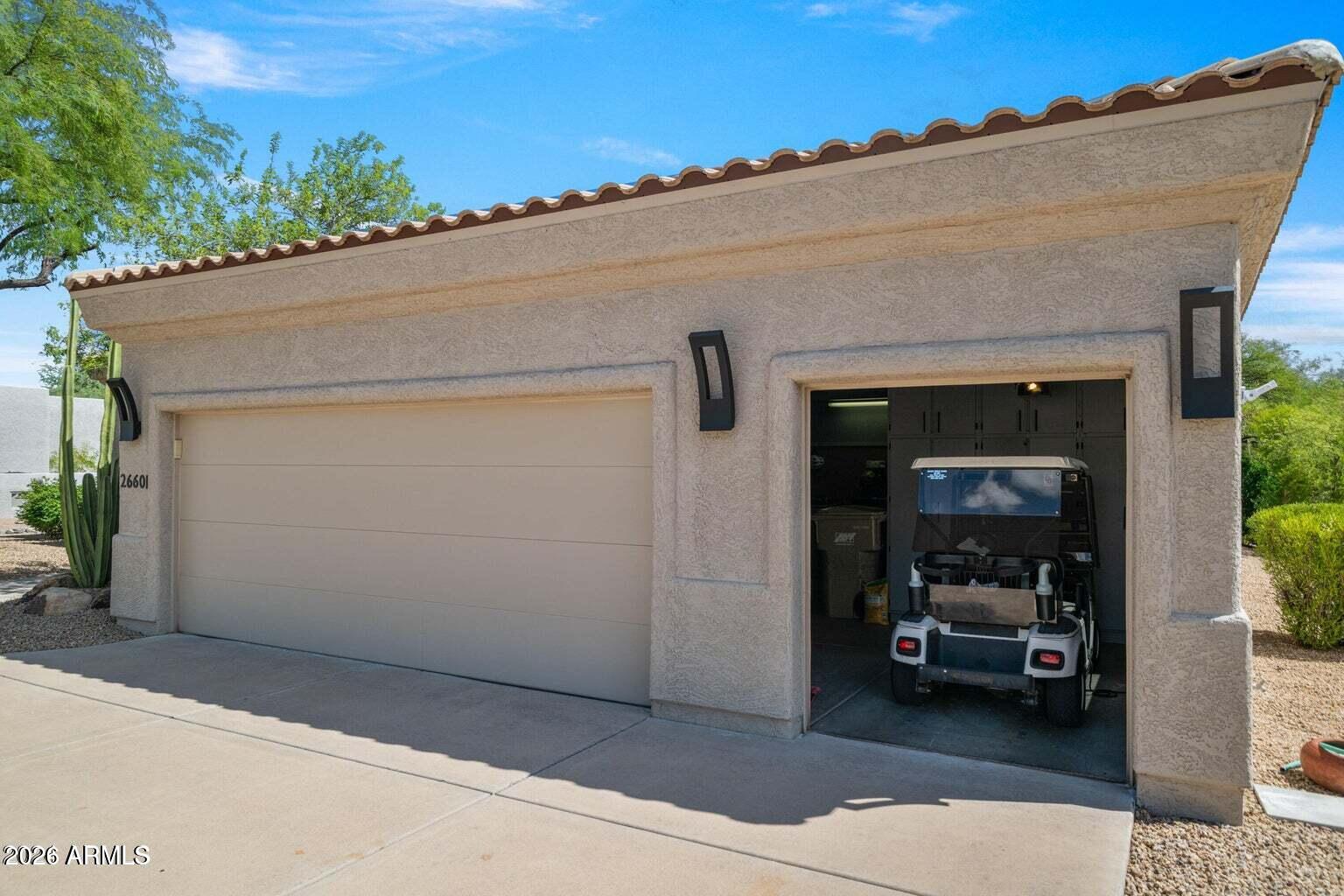 26601 North Aguila Road Rio Verde, AZ 85263 - Photo 44 of 45 a view of a car garage door