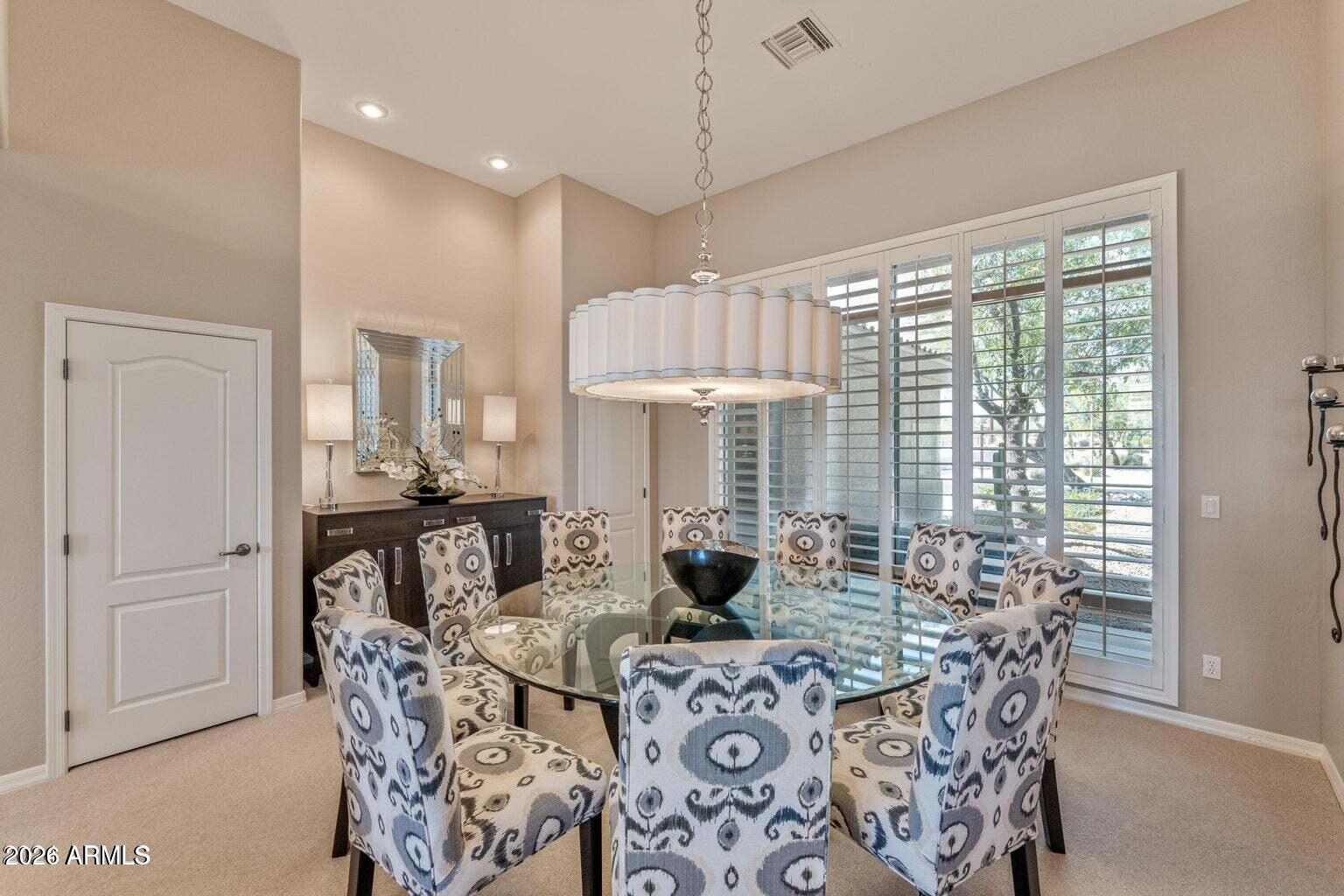 26601 North Aguila Road Rio Verde, AZ 85263 - Photo 6 of 45 a view of a dining room with furniture window and outside view