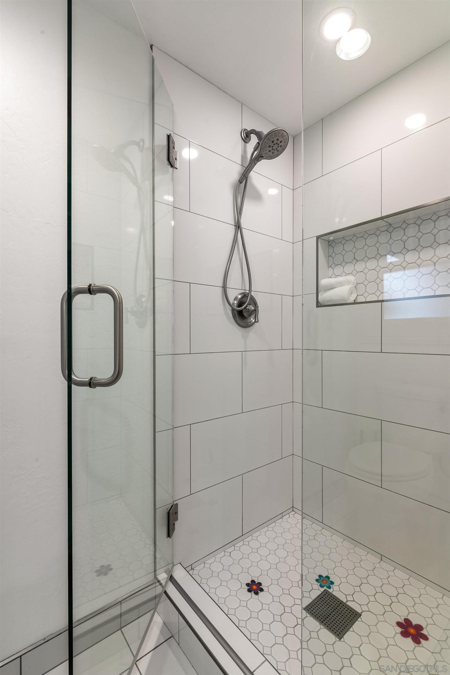 1264 Prospect Street La Jolla, CA 92037 - Photo 9 of 10 a bathroom with a shower