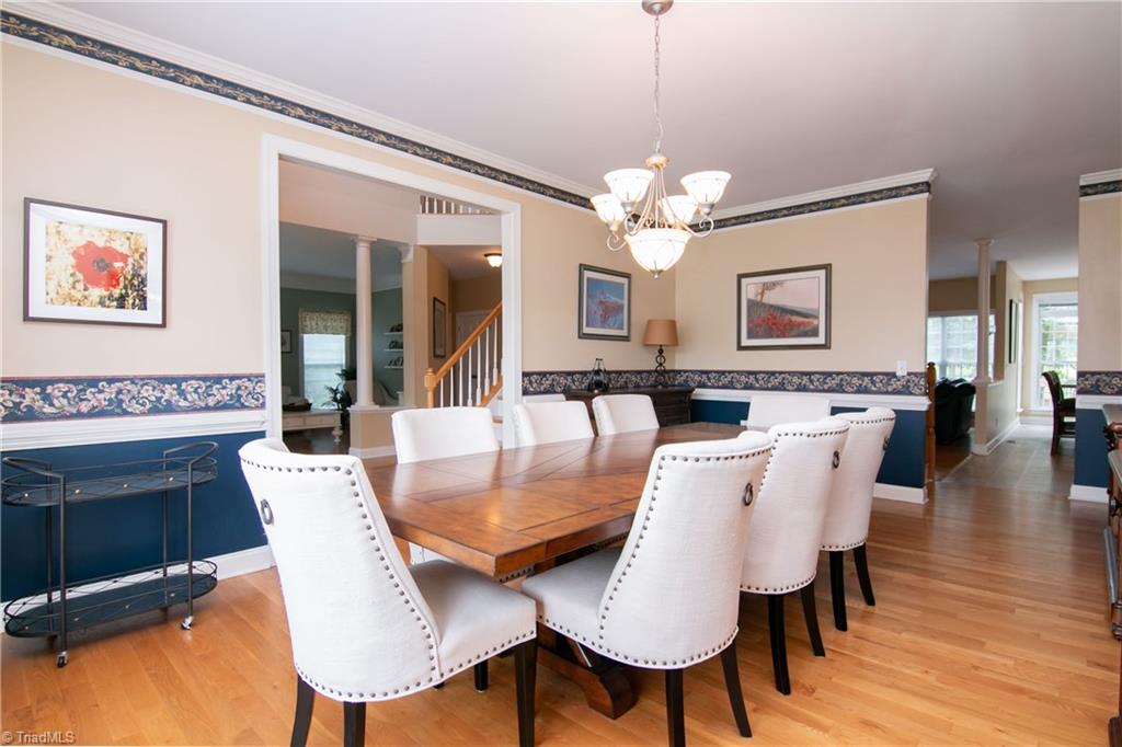 8412 Chartwell Drive Oak Ridge, NC 27310 - Photo 13 of 30 Formal dining room flows right into the kitchen