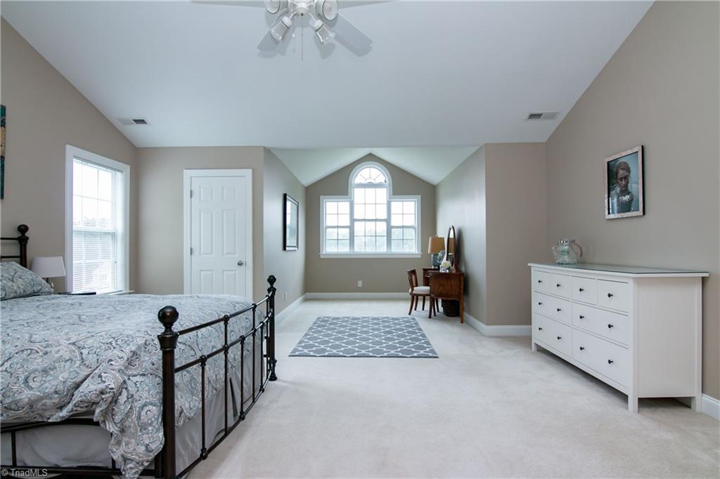 8412 Chartwell Drive Oak Ridge, NC 27310 - Photo 17 of 30 The master suite allows for your own private sitting area