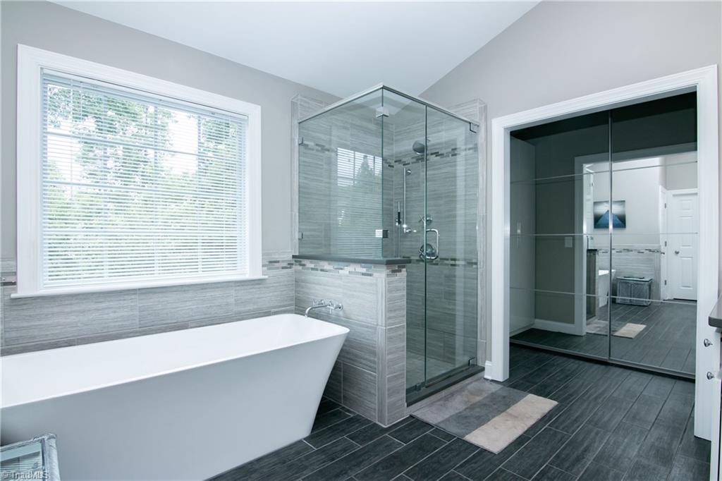 8412 Chartwell Drive Oak Ridge, NC 27310 - Photo 19 of 30 No expense spared on this luxurious master bathroom