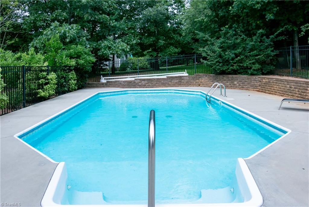 8412 Chartwell Drive Oak Ridge, NC 27310 - Photo 27 of 30 Summer does not have to end early when your pool is heated!