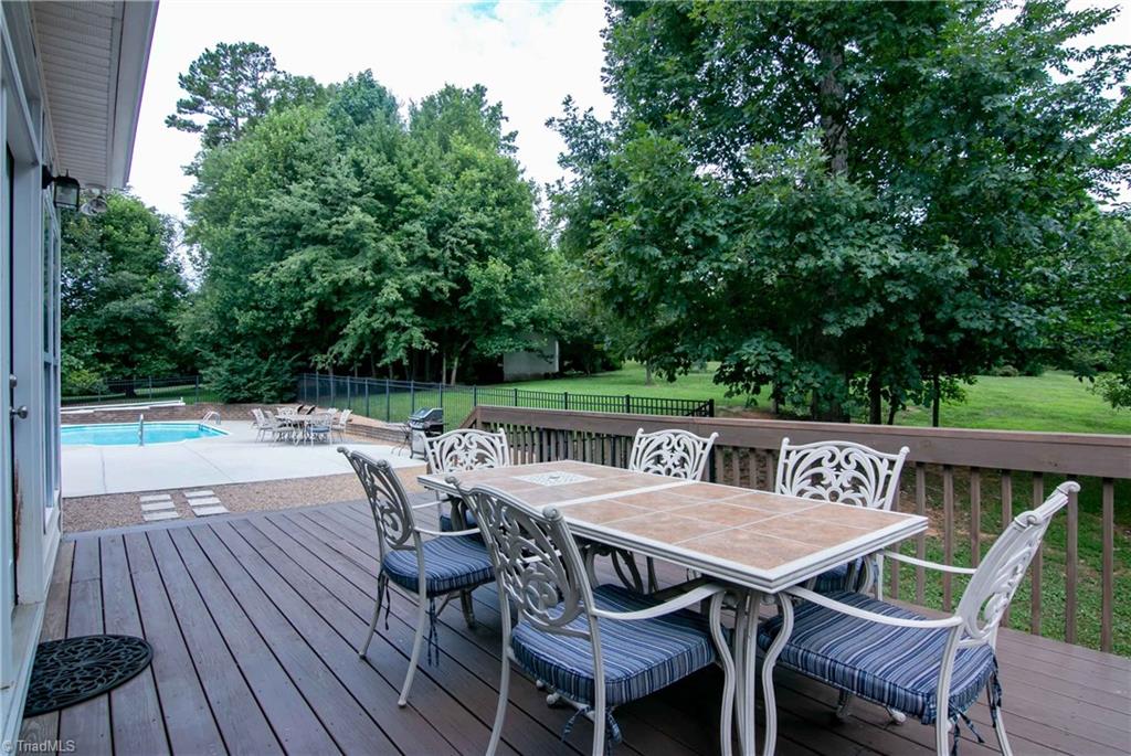 8412 Chartwell Drive Oak Ridge, NC 27310 - Photo 29 of 30 Great deck and patio area