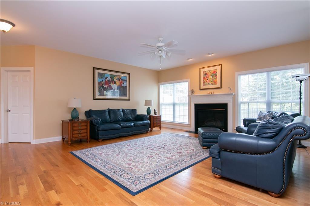 8412 Chartwell Drive Oak Ridge, NC 27310 - Photo 5 of 30 The gas logs in this fireplace makes it a cozy place to gather