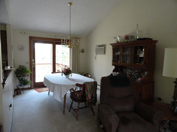 17 Michael Road Maynard, MA 01754 - Photo 4 of 20 a table and chairs in a room