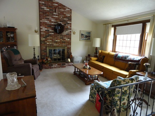 17 Michael Road Maynard, MA 01754 - Photo 5 of 20 a living room with furniture and a fireplace