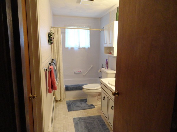 17 Michael Road Maynard, MA 01754 - Photo 6 of 20 a bathroom with a toilet a sink and a shower