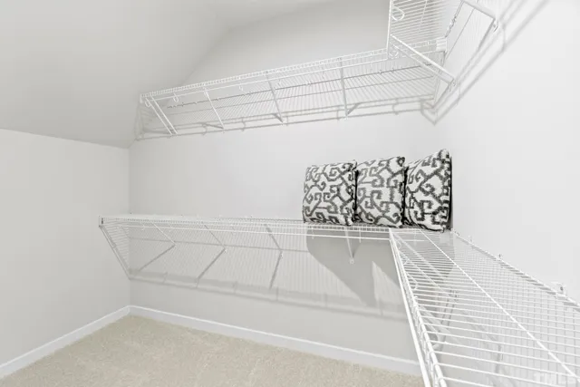 a view of a room with racks on the wall