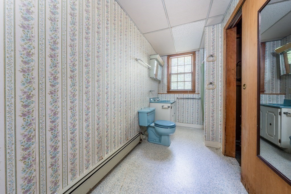 20 Alicia Road Barnstable, MA 02601 - Photo 21 of 24 a bathroom with a toilet sink and shower