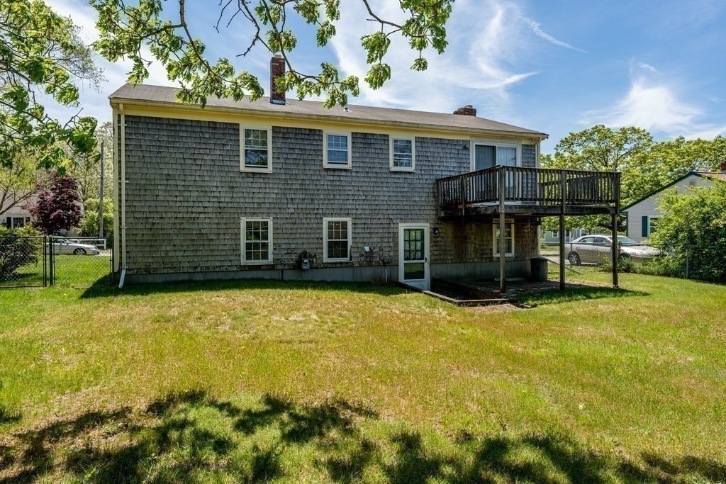20 Alicia Road Barnstable, MA 02601 - Photo 23 of 24 a front view of a house with a yard