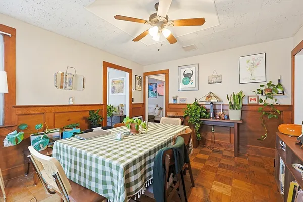 a view of a dining room with furniture