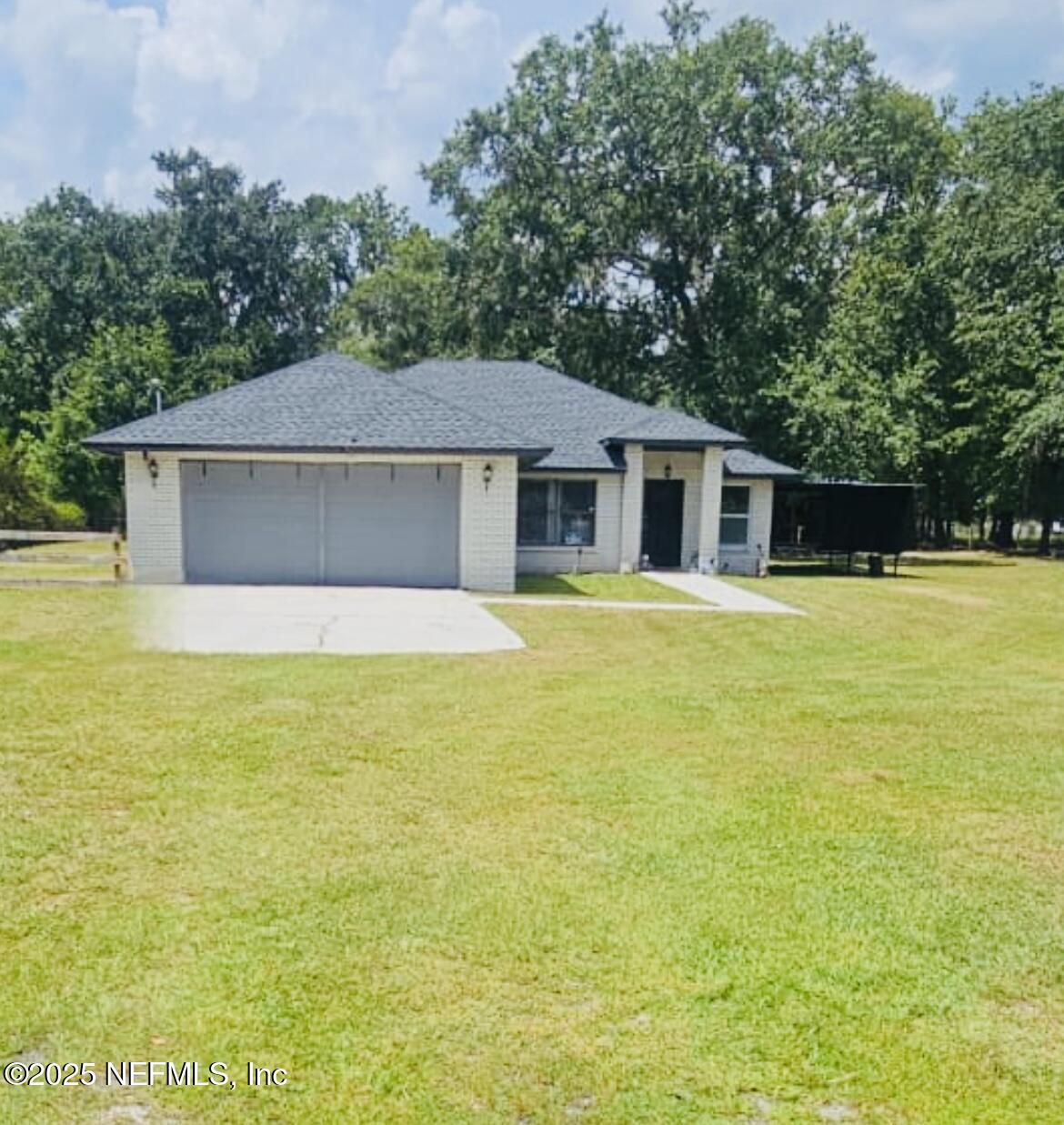a view of house with a swimming pool