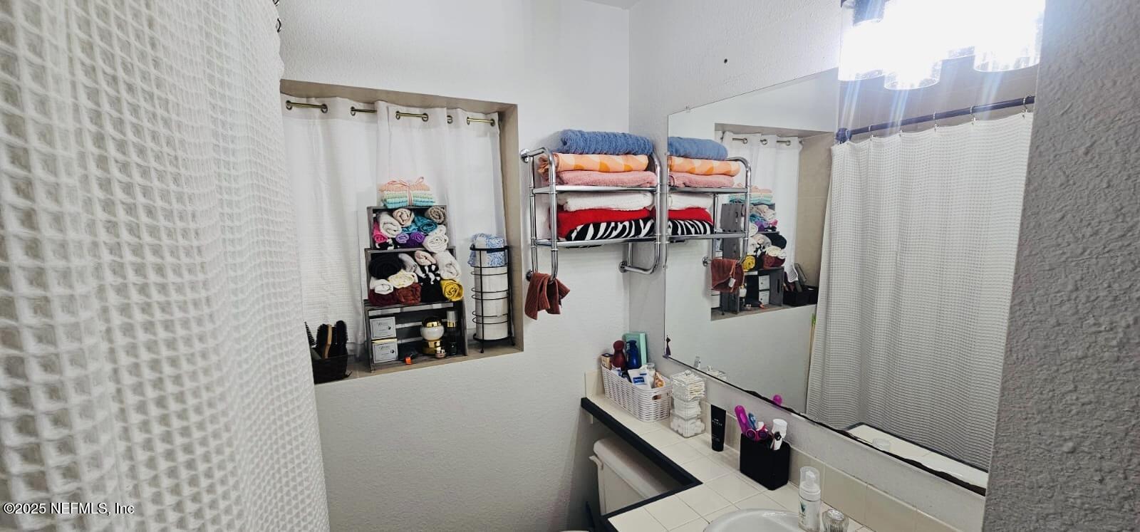 12961 5 Churches Road Sanderson, FL 32087 - Photo 27 of 34 a room with storage and utility