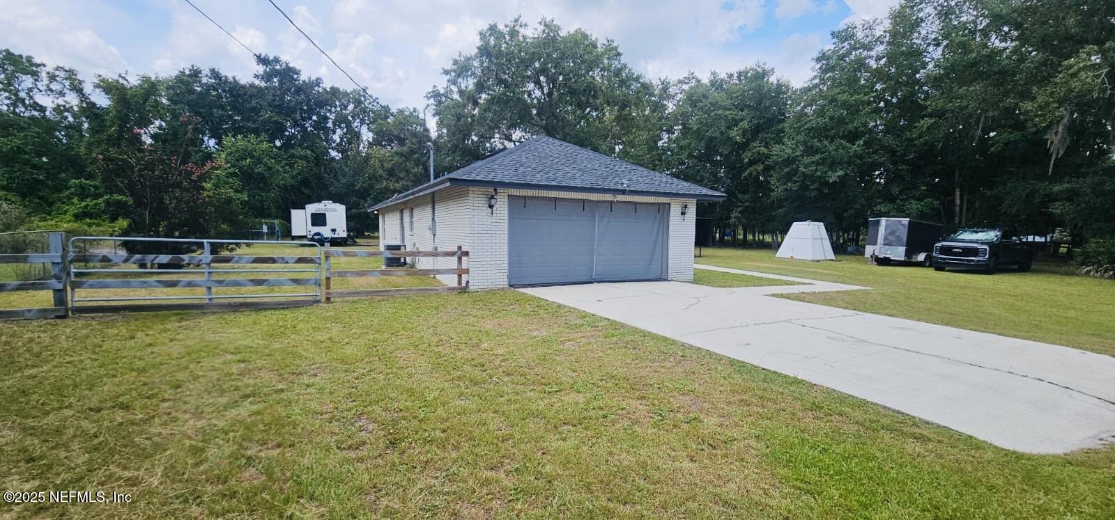 12961 5 Churches Road Sanderson, FL 32087 - Photo 4 of 34 a house view with swimming pool in front of it