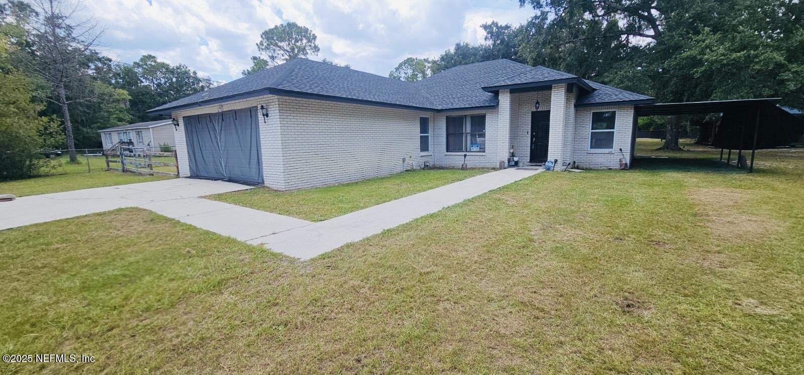 12961 5 Churches Road Sanderson, FL 32087 - Photo 5 of 34 a view of an house with backyard space and balcony
