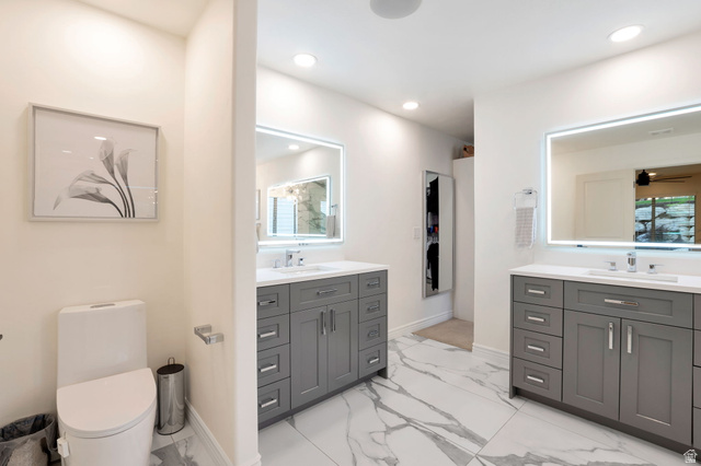 577 South Ridge Top Lane East North Salt Lake, UT 84054 - Photo 15 of 57 Dual vanities with abundant storage create a functional and elegant owner's bath.