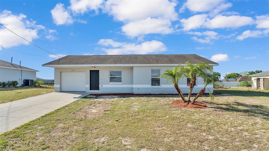 220 Lily Pad Road Eagle Lake, FL 33839 - Photo 1 of 1 a view of a backyard with a sitting area