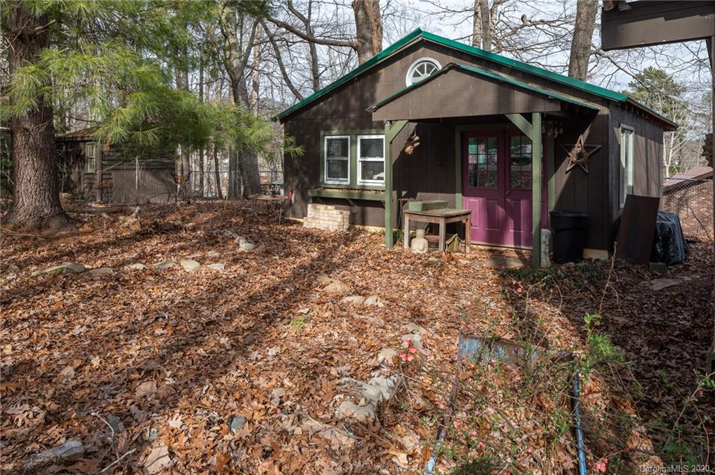 150 Oak Hill Road Candler, NC 28715 - Photo 14 of 25 a view of a house with a yard