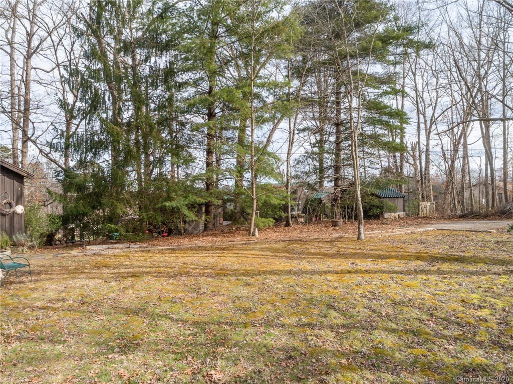 150 Oak Hill Road Candler, NC 28715 - Photo 19 of 25 a view of a house with a yard
