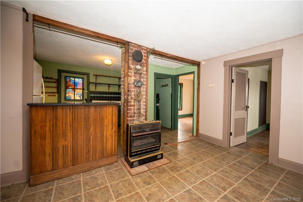 150 Oak Hill Road Candler, NC 28715 - Photo 6 of 25 a view of a hallway with entryway and stairs
