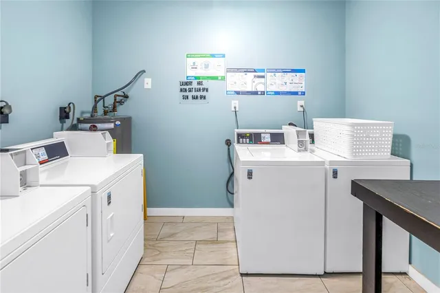 a utility room with dryer and washer