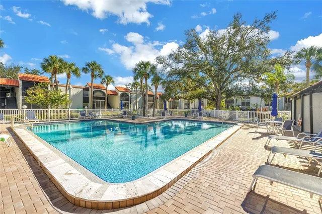 swimming pool view with a swimming pool