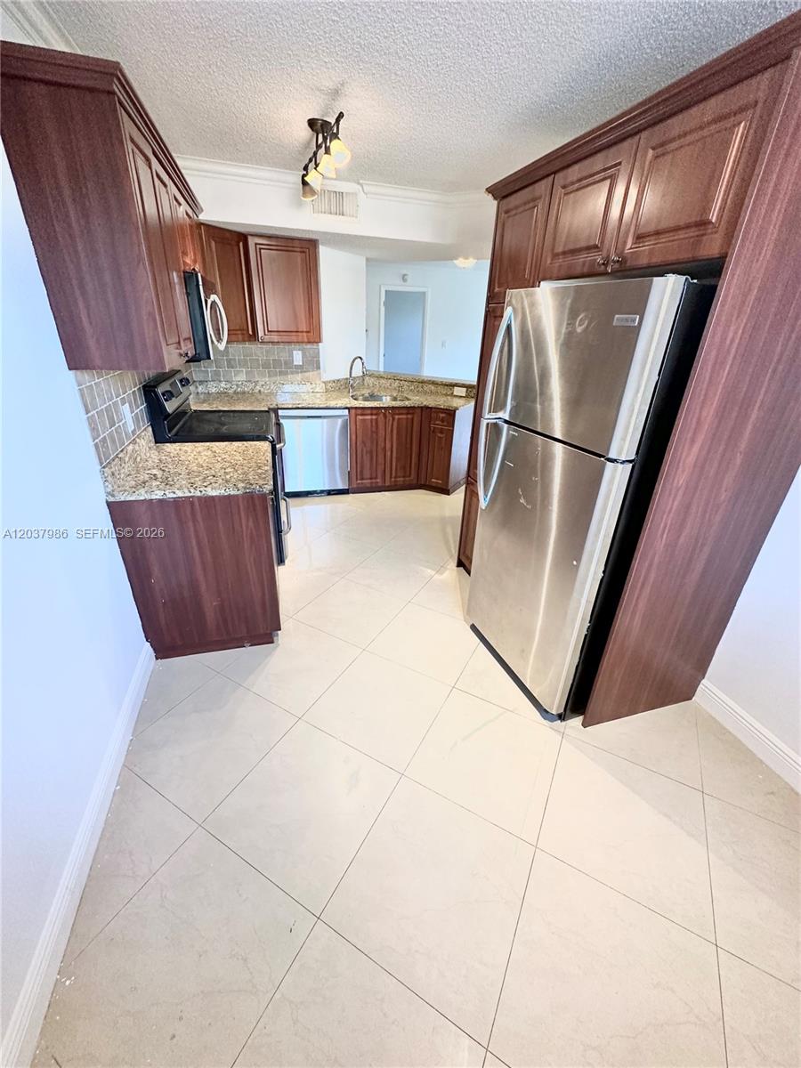 8955 Wiles Road, Unit 208 Coral Springs, FL 33067 - Photo 6 of 29