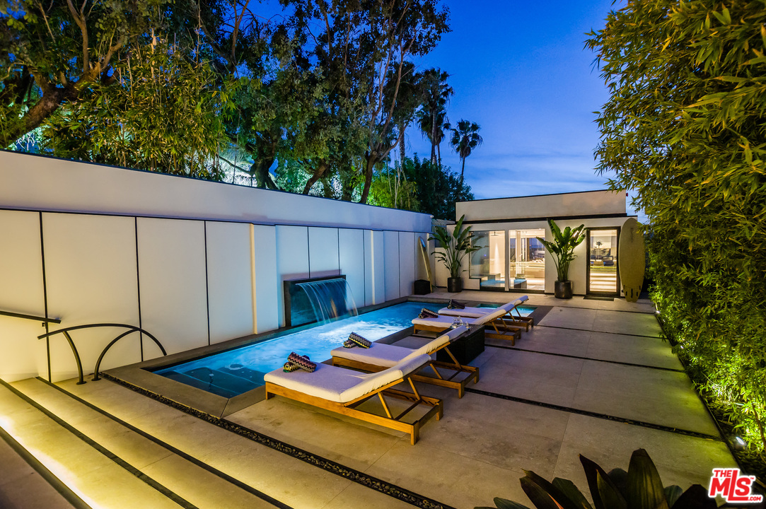 924 Palisades Beach Road Santa Monica, CA 90403 - Photo 36 of 54 a view of a patio with chairs and tables