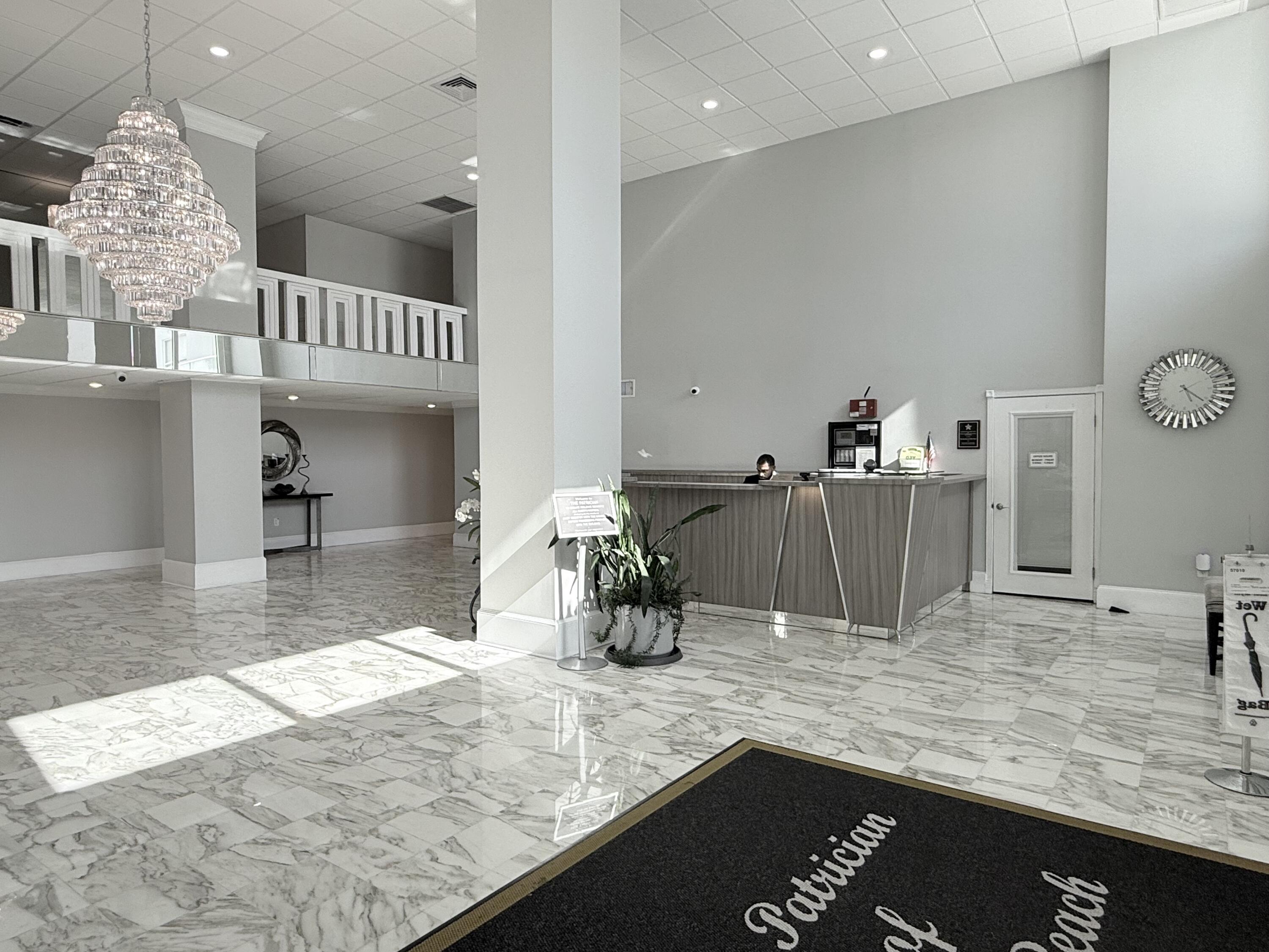 3450 South Ocean Boulevard, Unit 2220 Palm Beach, FL 33480 - Photo 20 of 36 a kitchen with a refrigerator and a sink