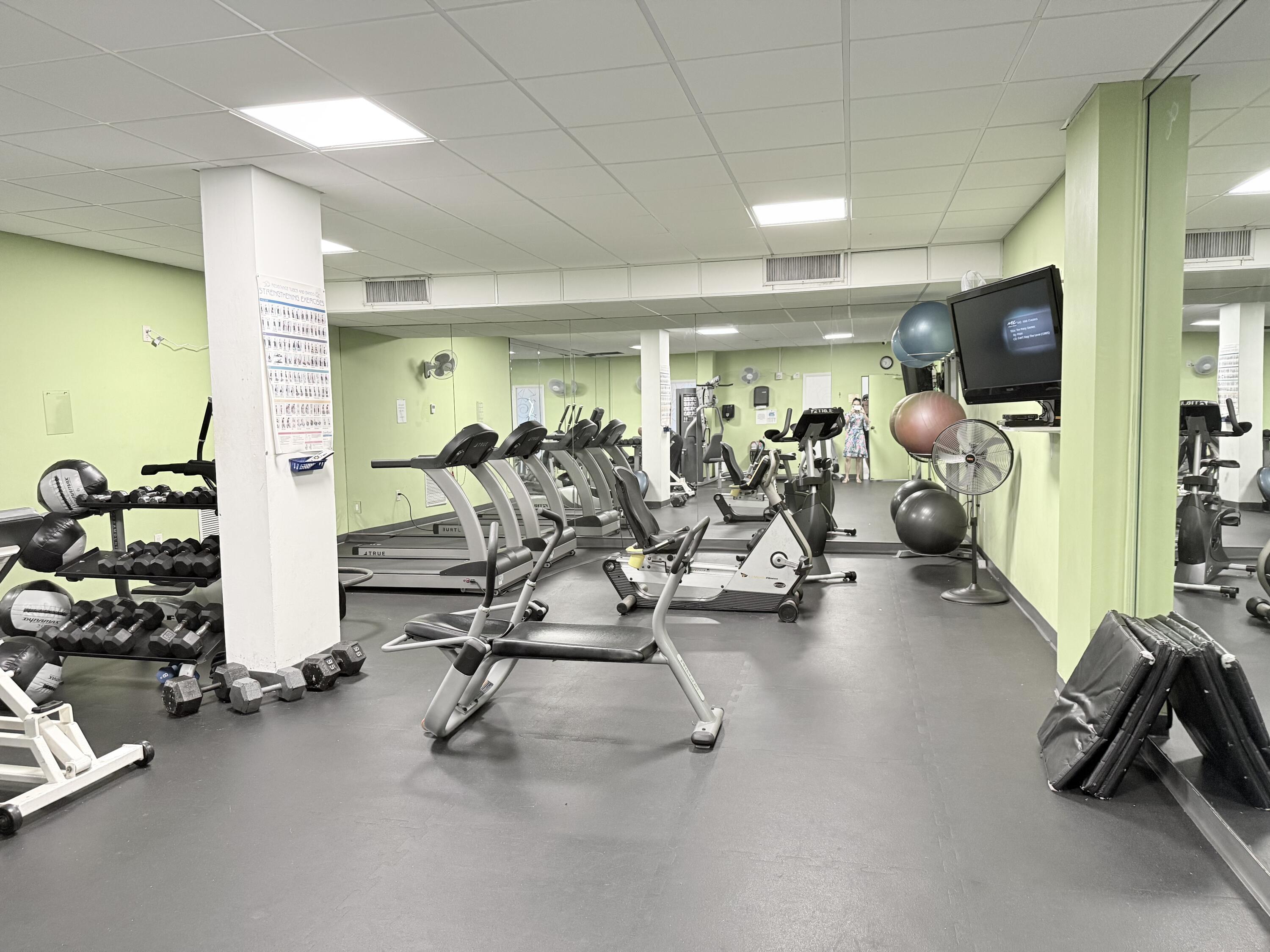 3450 South Ocean Boulevard, Unit 2220 Palm Beach, FL 33480 - Photo 23 of 36 a view of a room with gym equipment