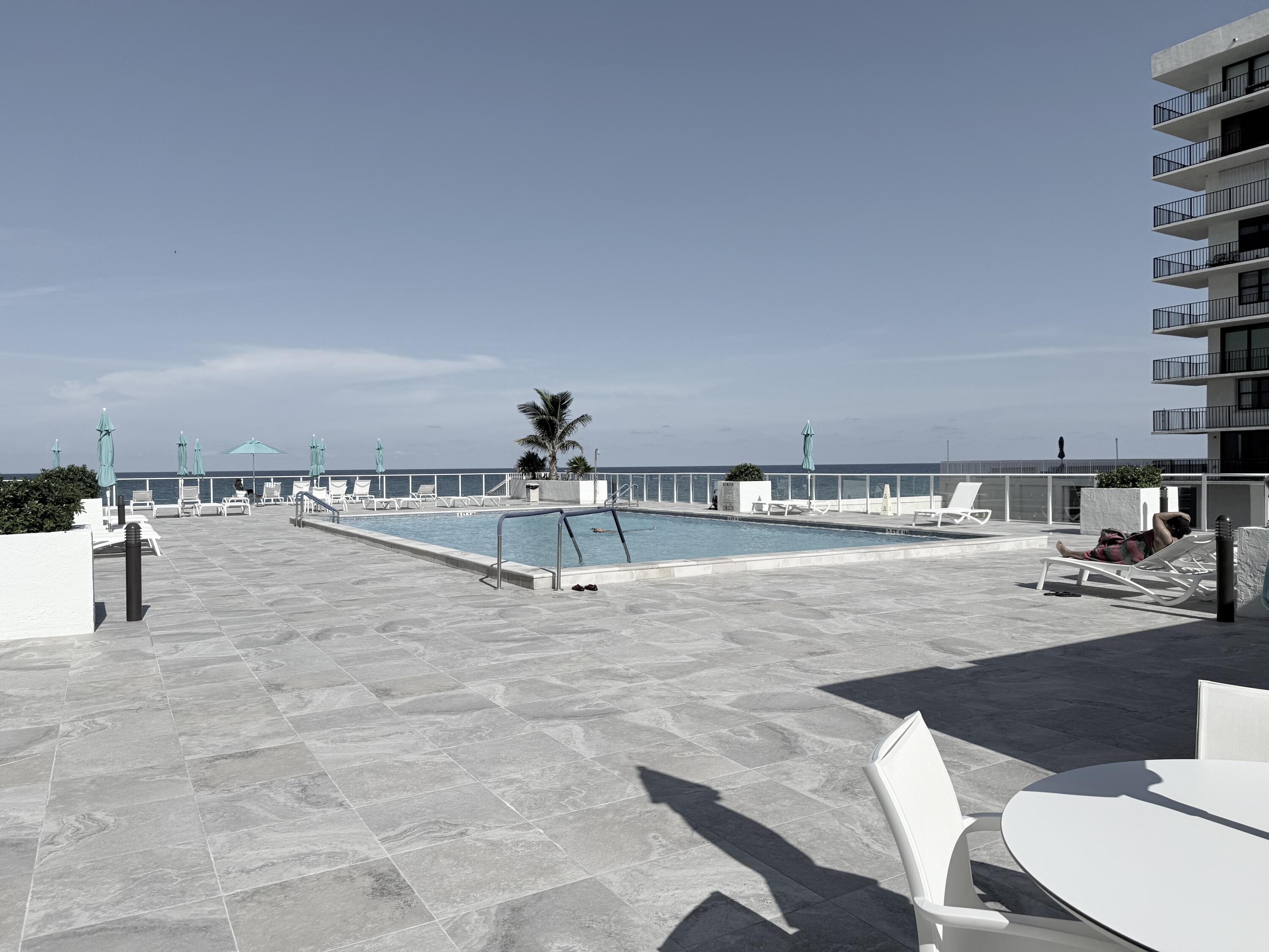 3450 South Ocean Boulevard, Unit 2220 Palm Beach, FL 33480 - Photo 27 of 36 a view of a kitchen and living room