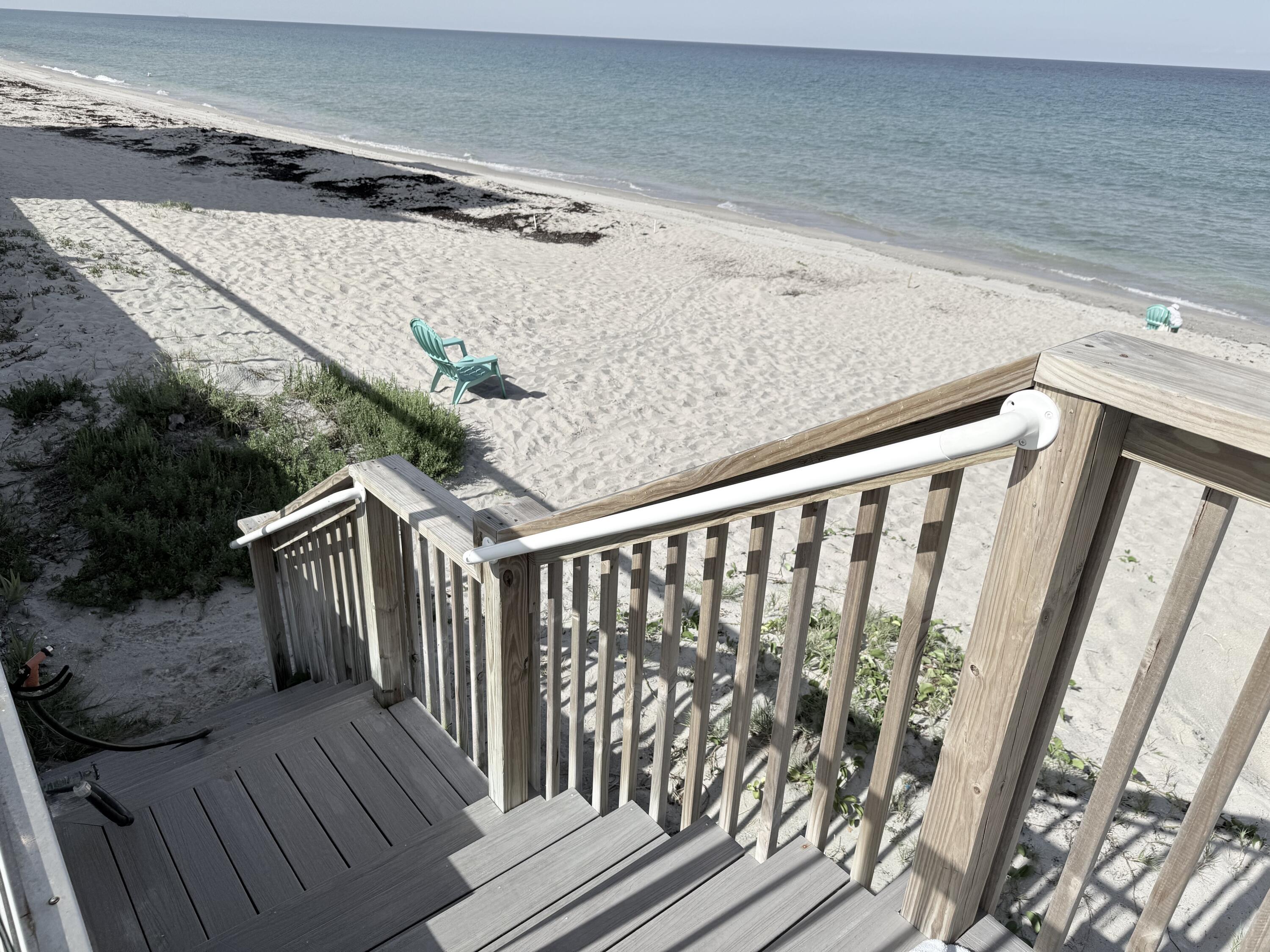 3450 South Ocean Boulevard, Unit 2220 Palm Beach, FL 33480 - Photo 35 of 36 a balcony with wooden floor