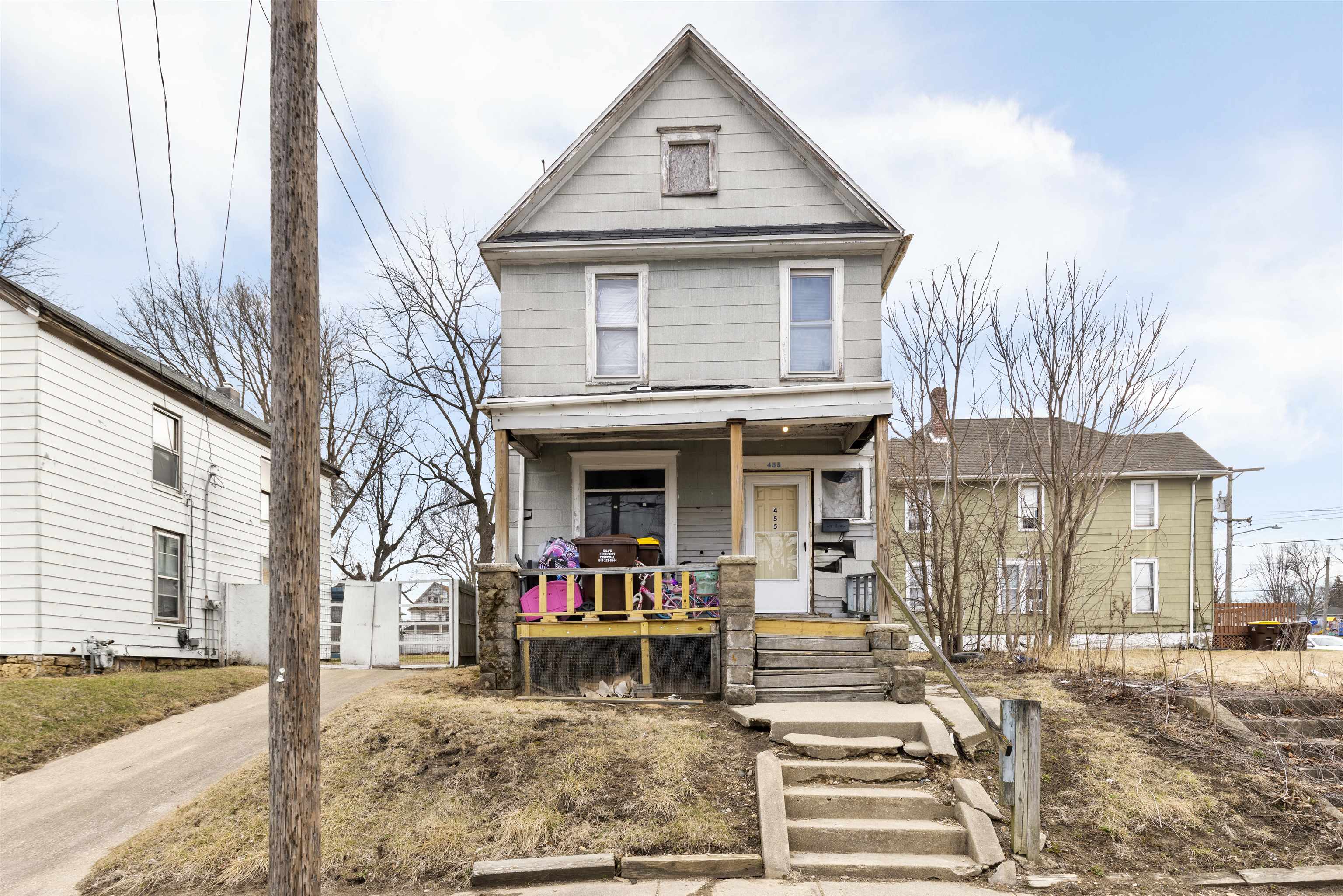 a front view of a house with a porch