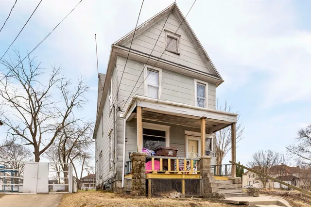 a front view of a house with street