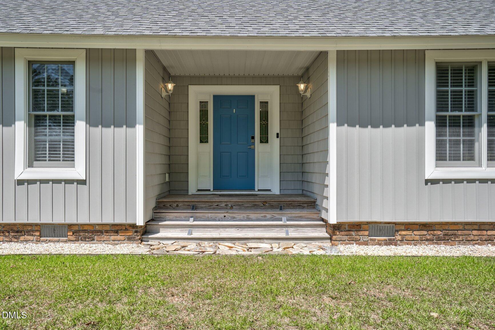 726 Thomas Road Rocky Mount, NC 27801 - Photo 3 of 55 a view of a house with small garden