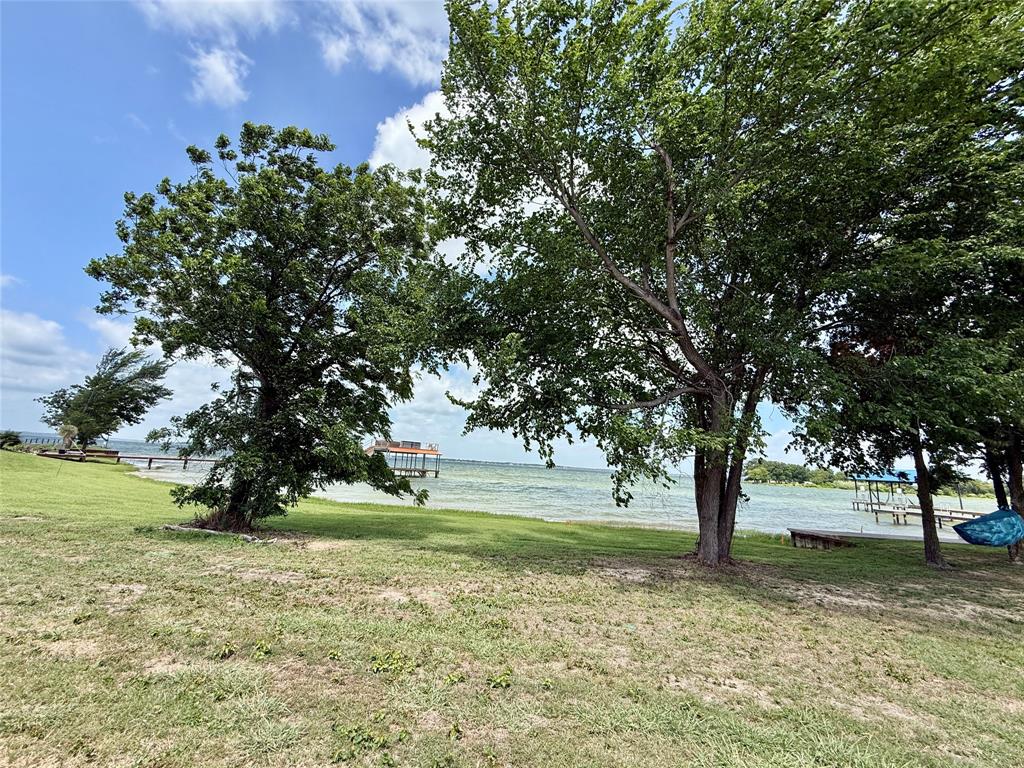 5136 Peninsula Road Kerens, TX 75144 - Photo 12 of 40 Waterfront lot with mature trees and lake access.