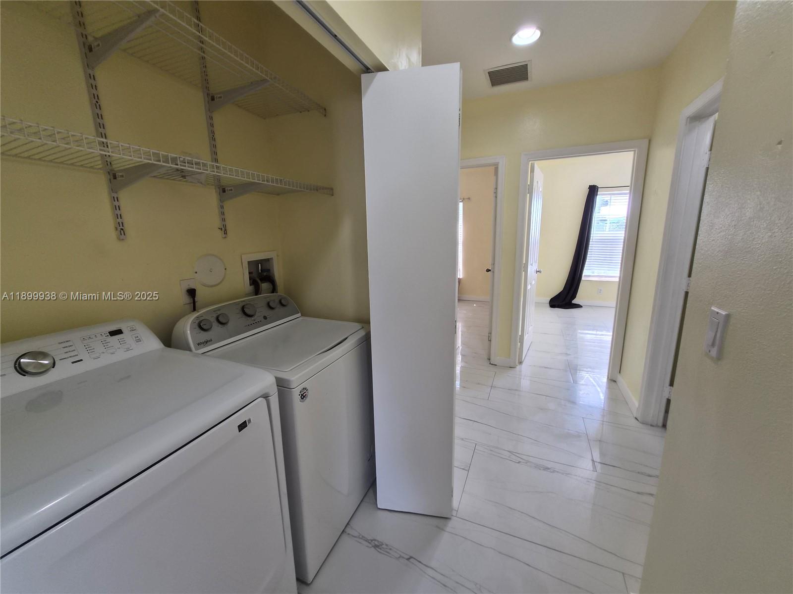 1209 Northwest 27th Avenue Pompano Beach, FL 33069 - Photo 15 of 22 a view of utility room