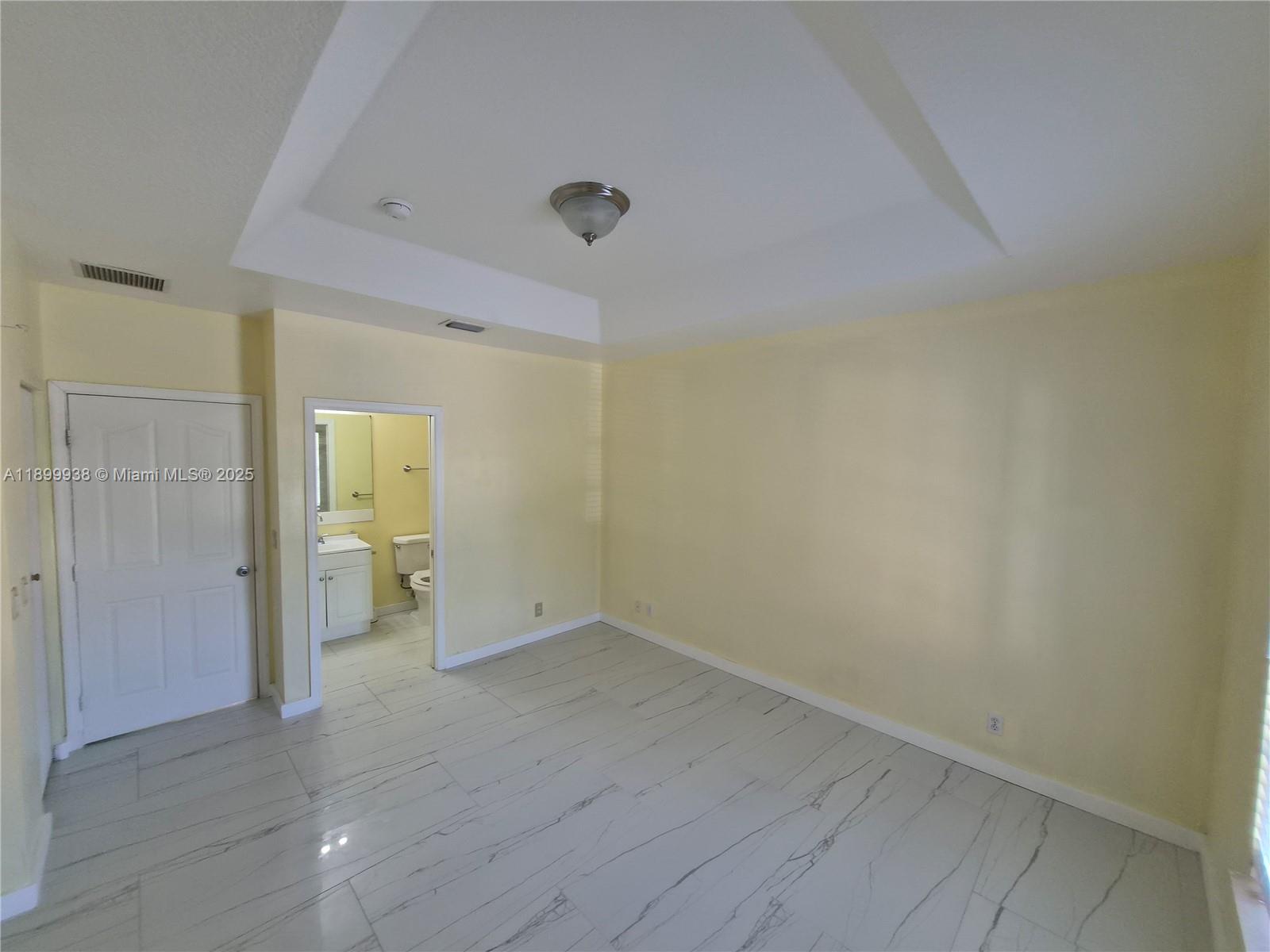 1209 Northwest 27th Avenue Pompano Beach, FL 33069 - Photo 21 of 22 wooden floor in an empty room