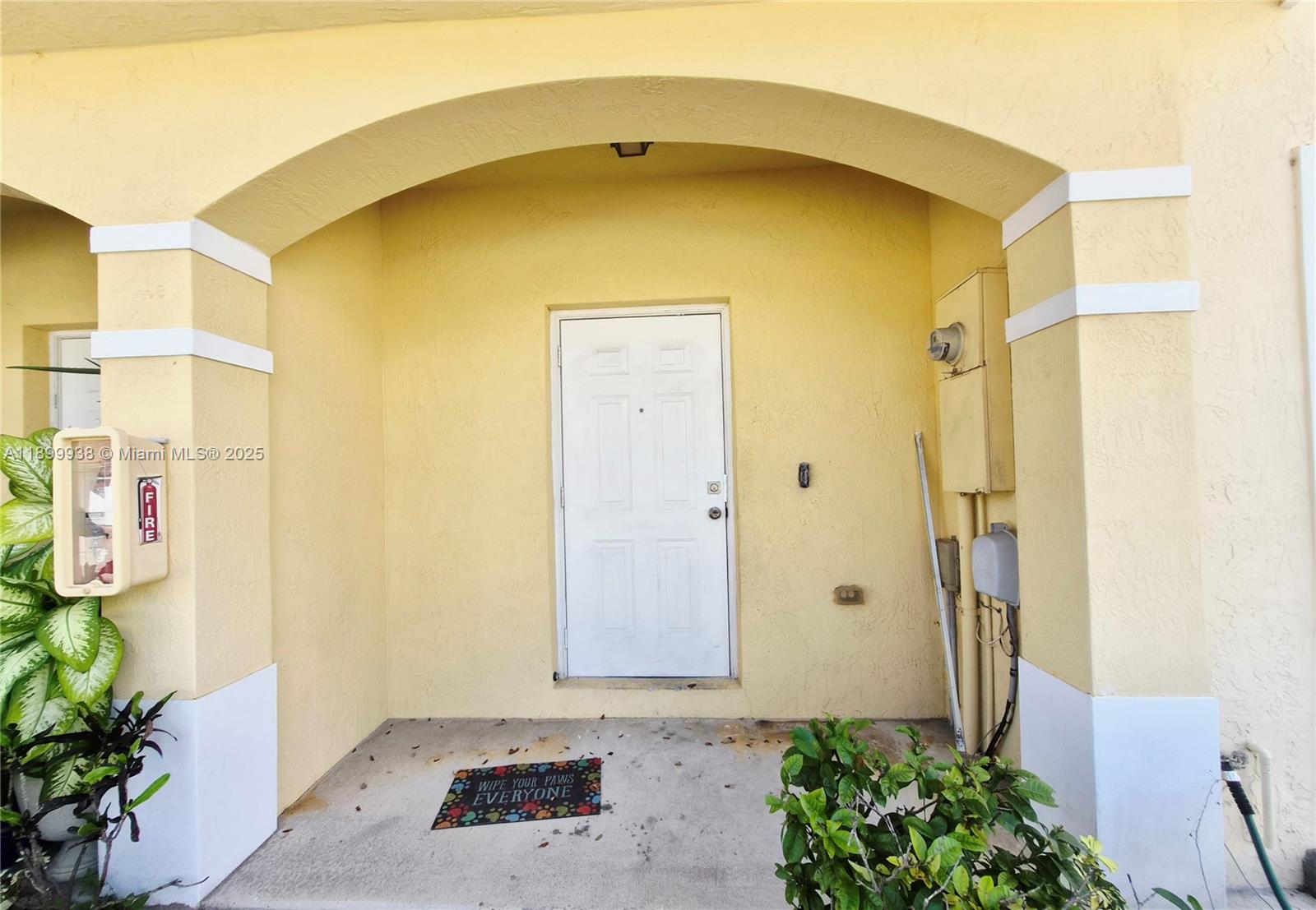 1209 Northwest 27th Avenue Pompano Beach, FL 33069 - Photo 3 of 22 a front door view of a house