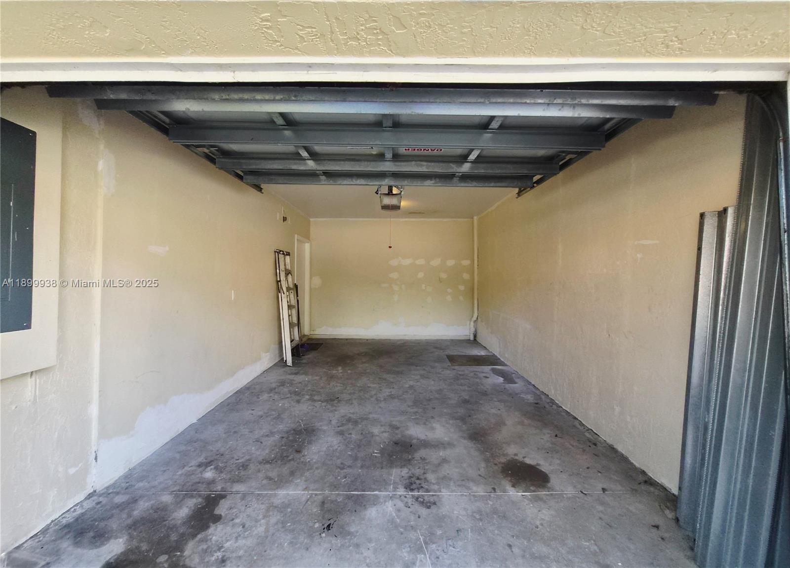 1209 Northwest 27th Avenue Pompano Beach, FL 33069 - Photo 4 of 22 a view of a garage