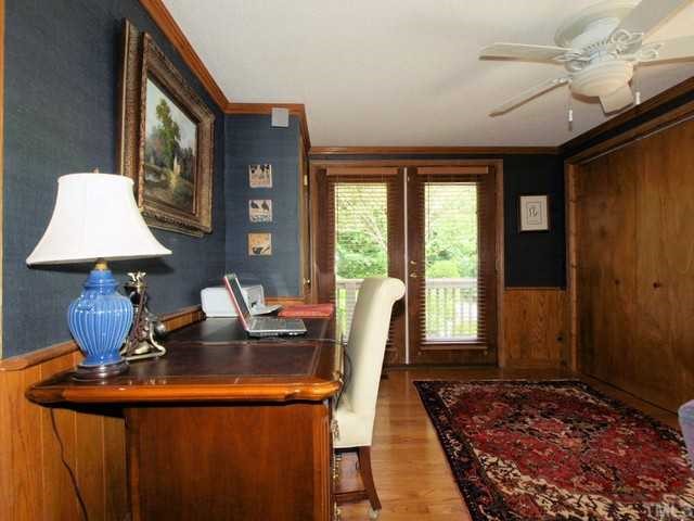 8804 Highhill Road Raleigh, NC 27615 - Photo 6 of 12 a living room with furniture and wooden floor