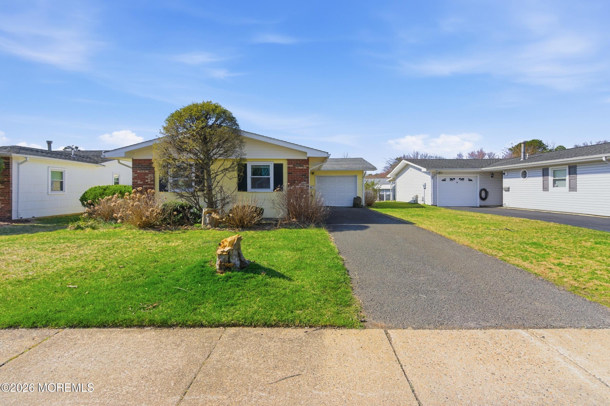 a front view of house with yard