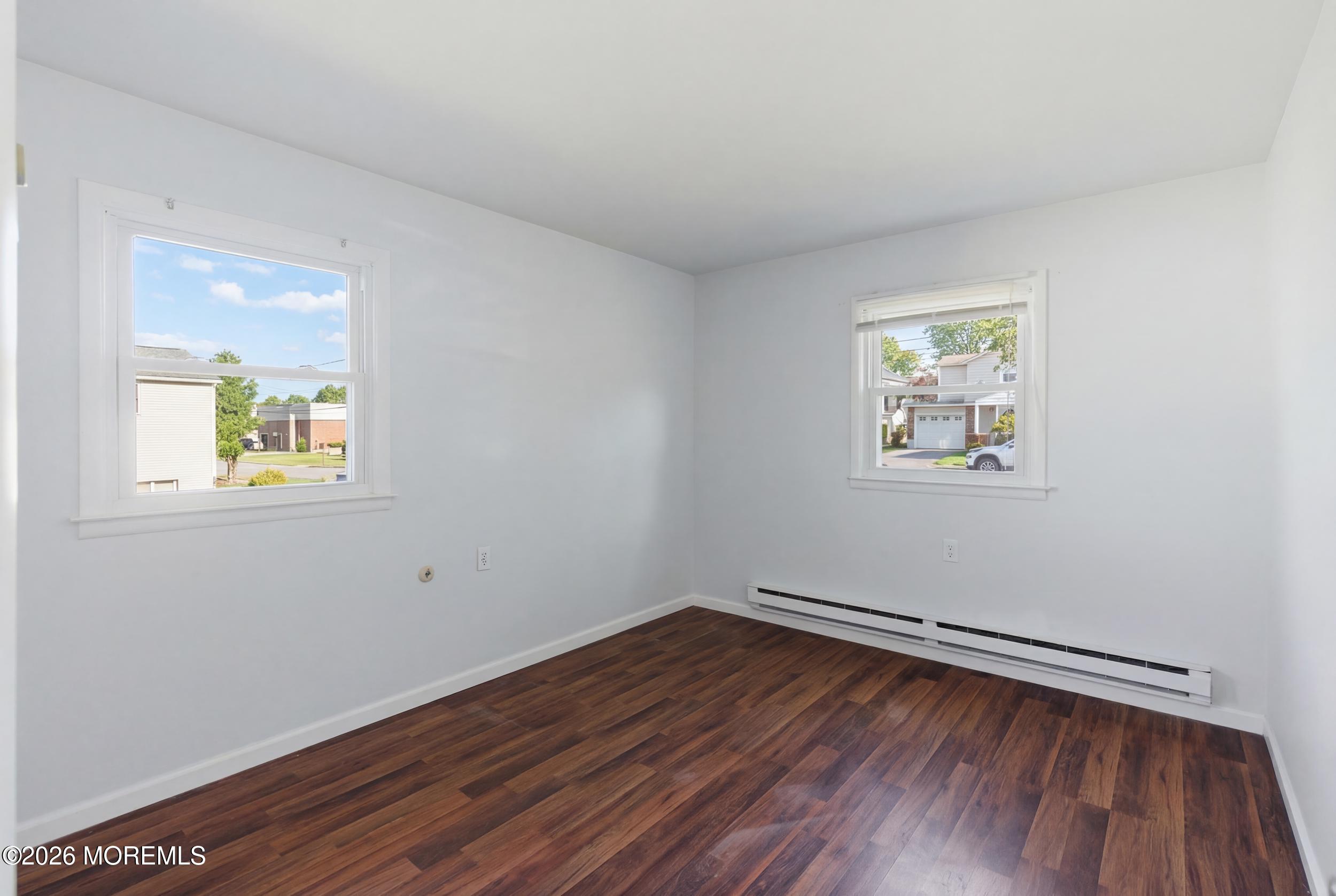 93 Baser Lane Brick, NJ 08724 - Photo 16 of 21 a view of a room with wooden floor and window