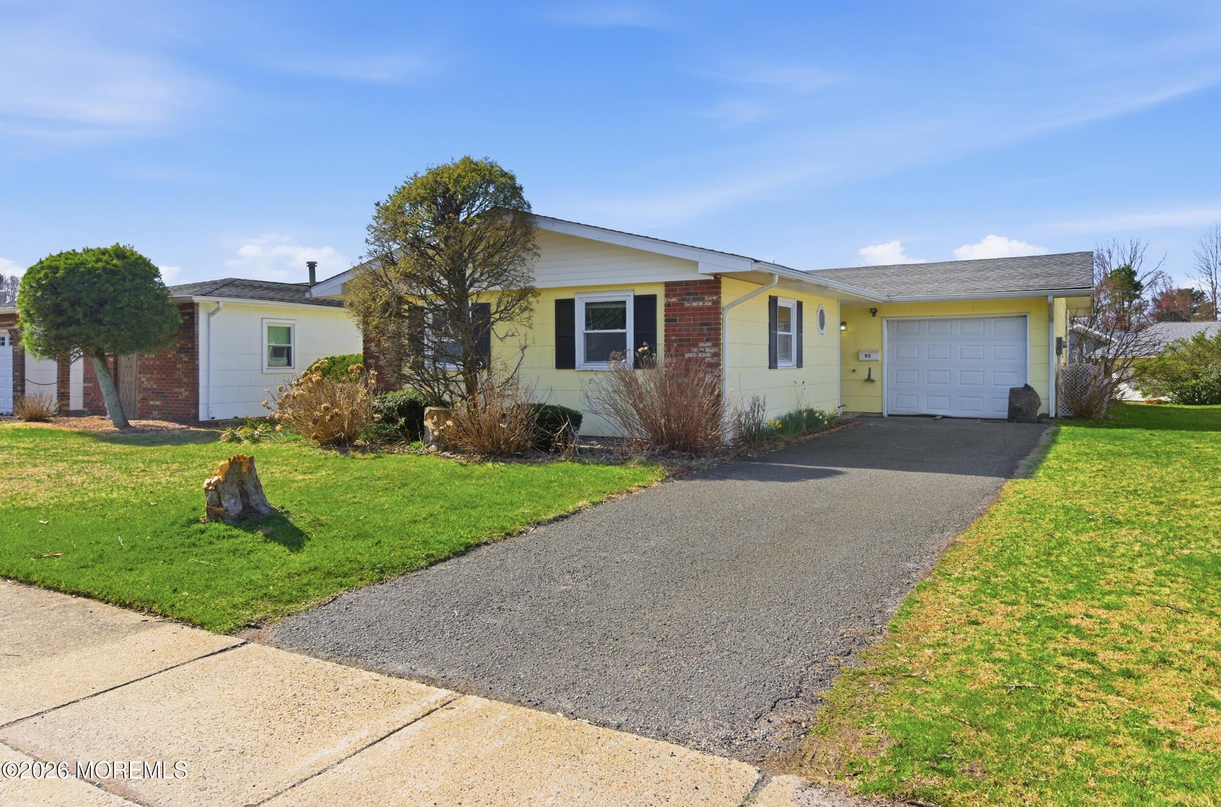 93 Baser Lane Brick, NJ 08724 - Photo 3 of 21 a front view of house with yard and green space