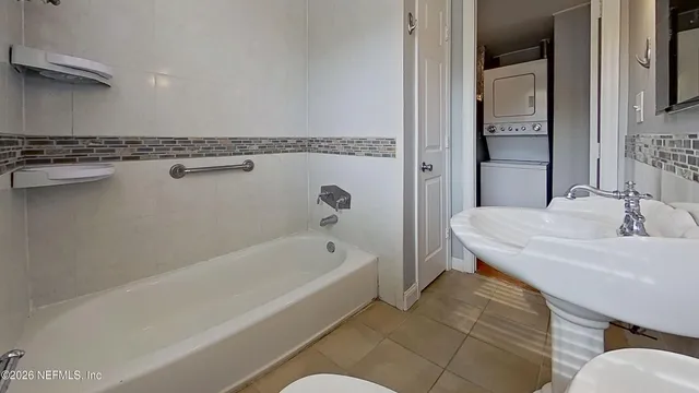 a bathroom with a sink and a bathtub