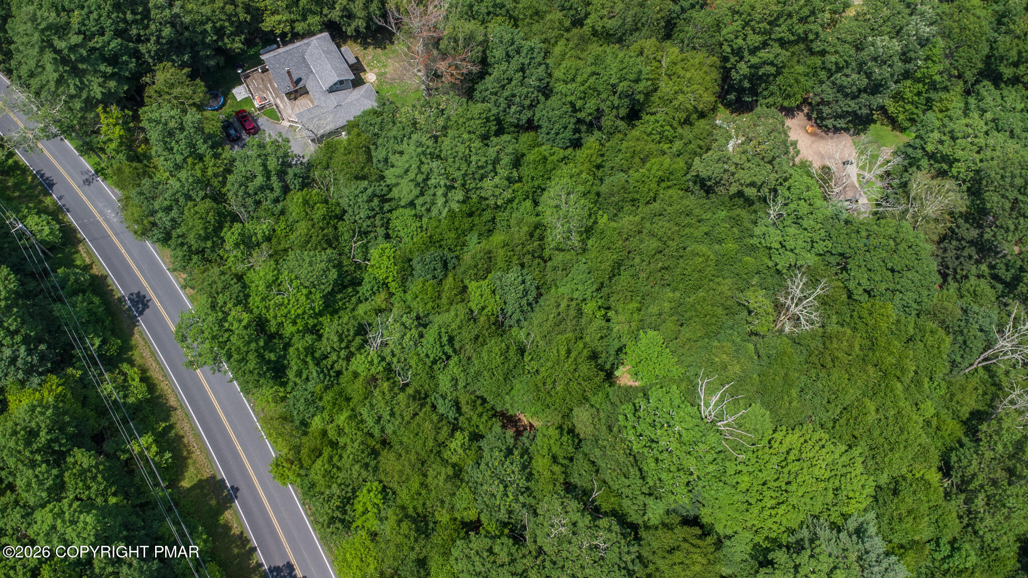 0 Coolbaugh Road East Stroudsburg, PA 18302 - Photo 5 of 18 a view of a lush green forest with lots of trees
