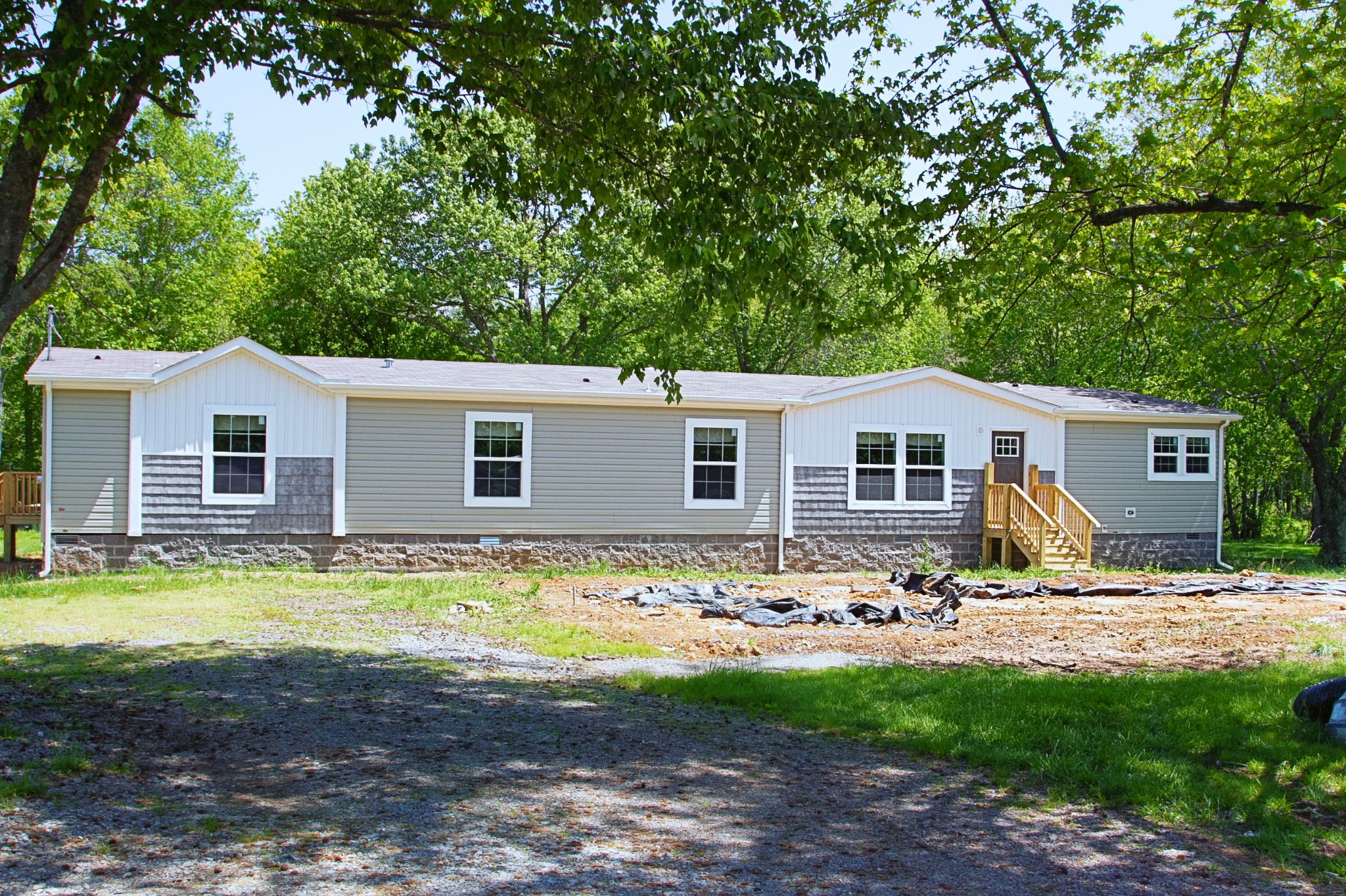 2555 Liverpool Road Woodlawn, TN 37191 - Photo 19 of 21 a view of a house with backyard and sitting area