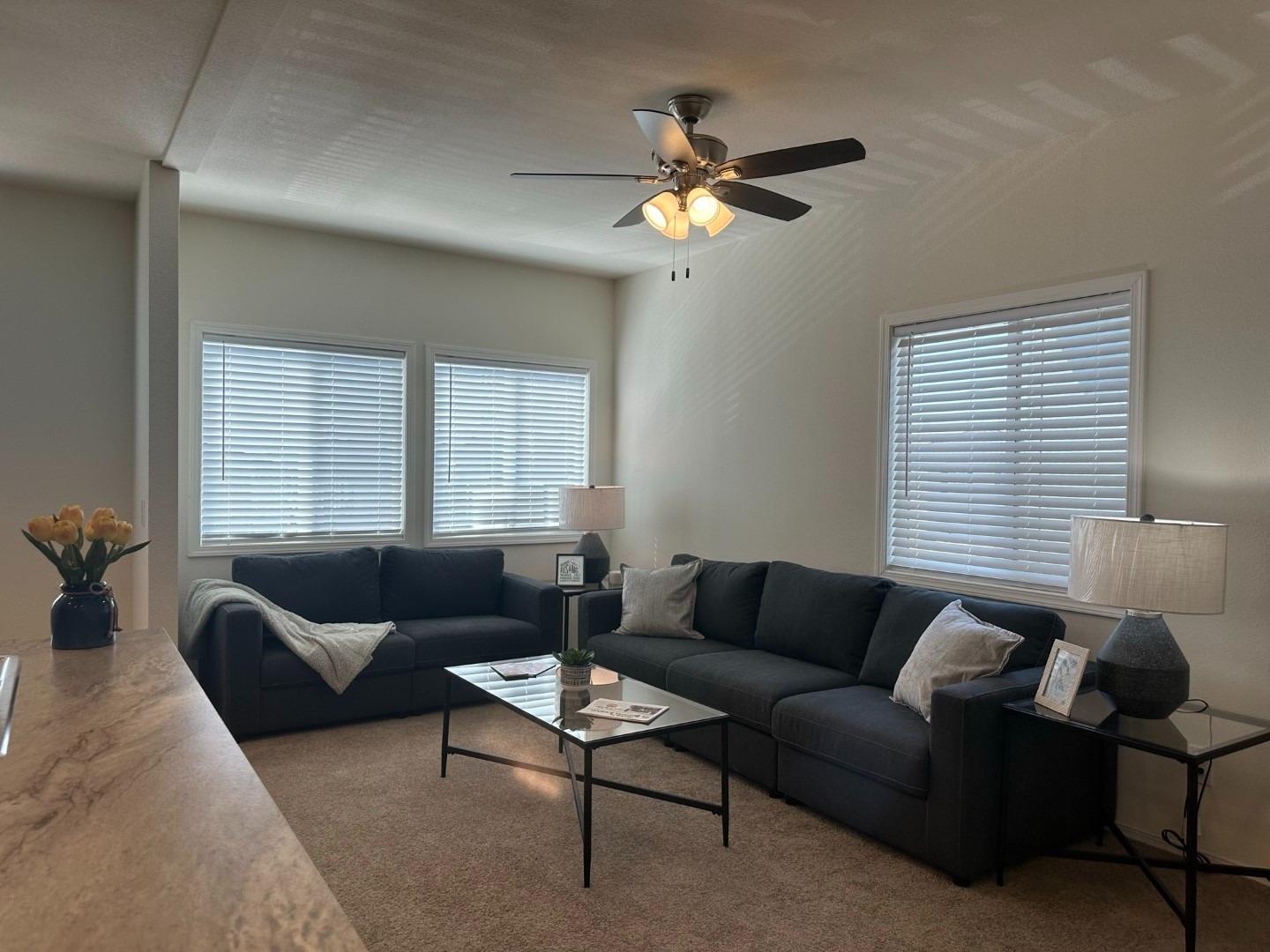 5812 Cedars Road, Unit 3 Redding, CA 96001 - Photo 5 of 14 a living room with furniture and a large window
