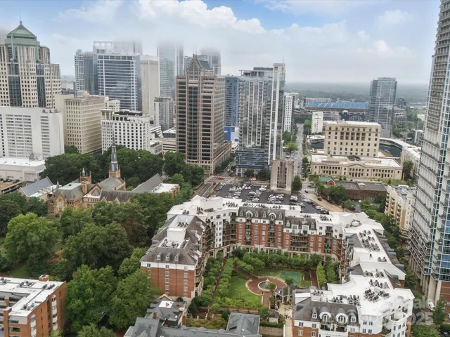 a view of a city with tall buildings